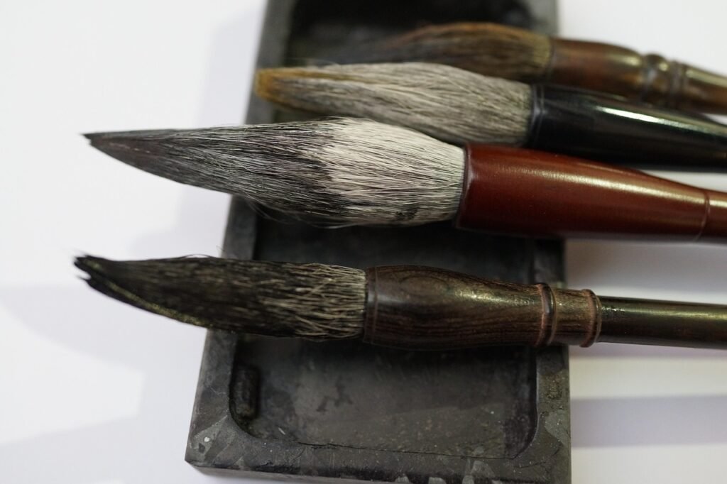 chinese calligraphy brushes, aesthetic, artistic expression, highly esteemed, chinese cultural sphere